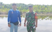 Cegah Kebakaran Lahan, Babinsa Koramil 02/Bukit Kapur Intensifkan Patroli Terpadu