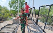 TNI Kodim Dumai Wujudkan Akses Penghubung Warga Lewat Pembangunan Jembatan Gantung Garuda