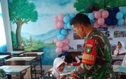Babinsa Koramil 01/Dumai Dampingi Penyaluran MBG kepada 2.118 Penerima Manfaat