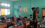 997 Siswa dan Balita di Bukit Kapur Nikmati Makan Bergizi Gratis, Babinsa Pastikan Distribusi Tepat Sasaran