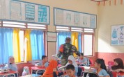 Koramil 02 Bukit Kapur Kawal Distribusi Gizi Pelajar di Tiga Sekolah